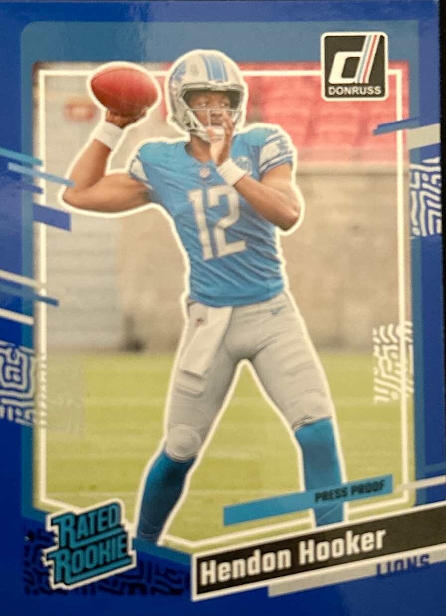 2023 Panini Donruss- Press Proof Blue #329- Hendon Hooker (RC) Detroit Lions