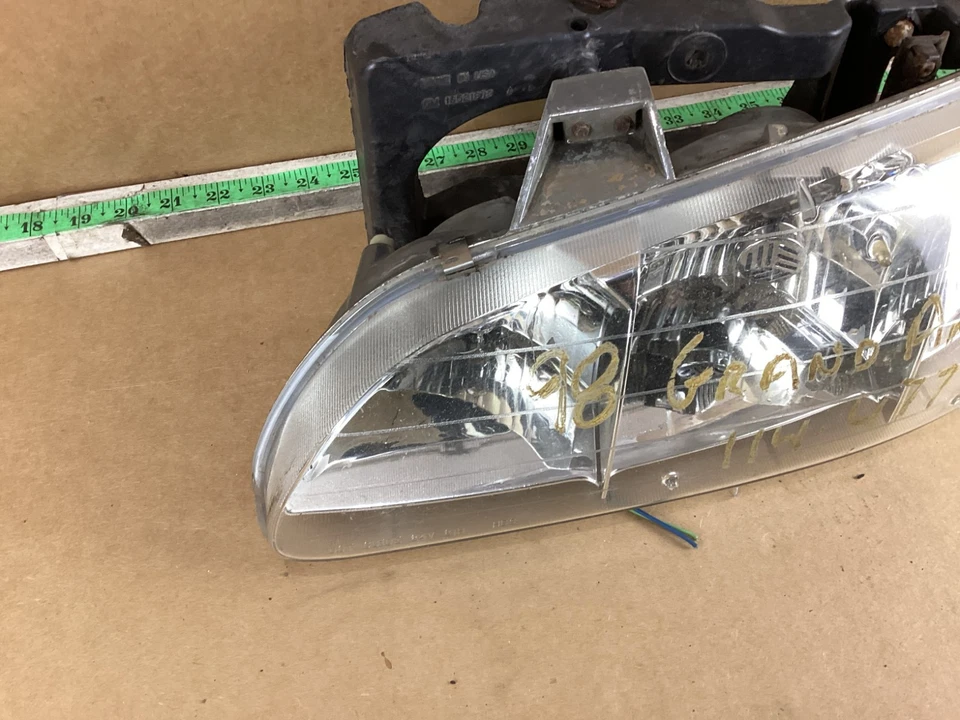 Conjunto de faros delanteros izquierdo del lado del conductor Pontiac Grand Am 1992-1998 Foto 3 de 4