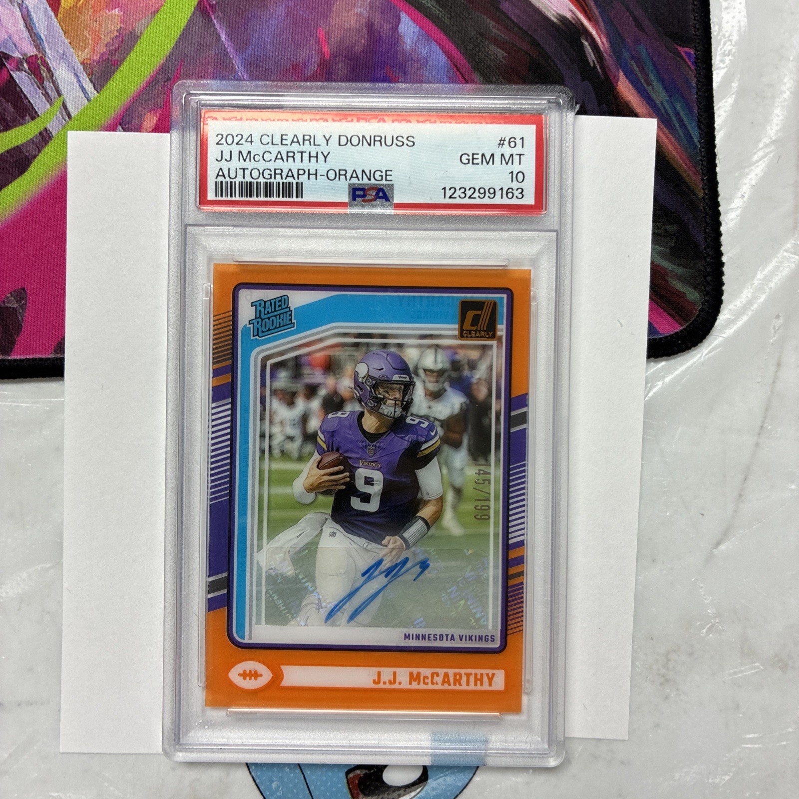 JJ McCarthy Panini Clearly Donruss #61 Autograph-Orange