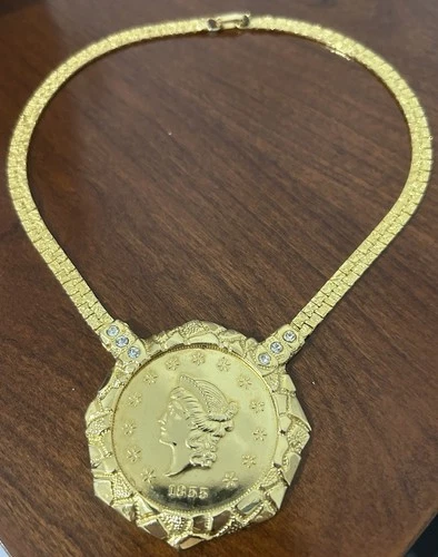 Vintage costume jewelry gold tone necklace with medallion