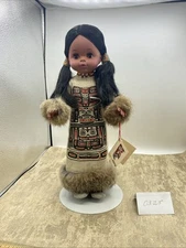 native Indian doll with formal dress by BOMA 15” tall stand included Canada