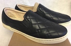 ugg black slip on sneakers