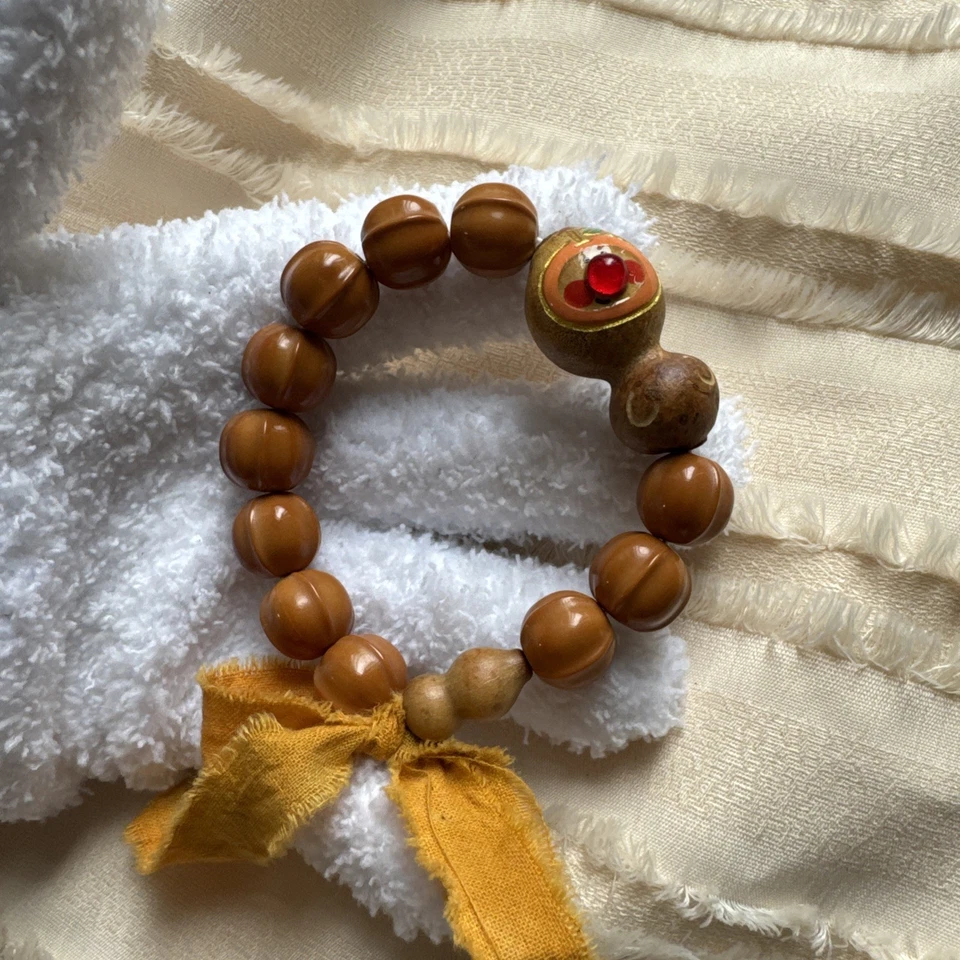 Pulsera china de semillas de bodhi, nogal y calabaza pintada中国文玩 Foto 2 de 4