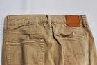 AMERICAN EAGLE OUTFITTERS AIR FLEX SLIM, W31 L34 KHAKI JEANS — photo 2