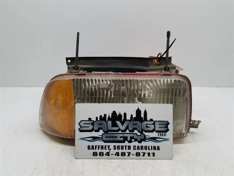 Faro de pasajero compuesto GMC para 94-97 GMC Sonoma OEM Foto 2 de 4