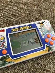 Instruction Manual Included. Excellent Game & Watch Ultraman Club Duel! Evil