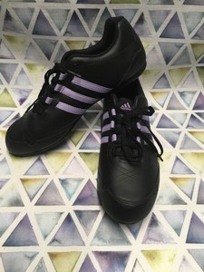 black and purple adidas trainers