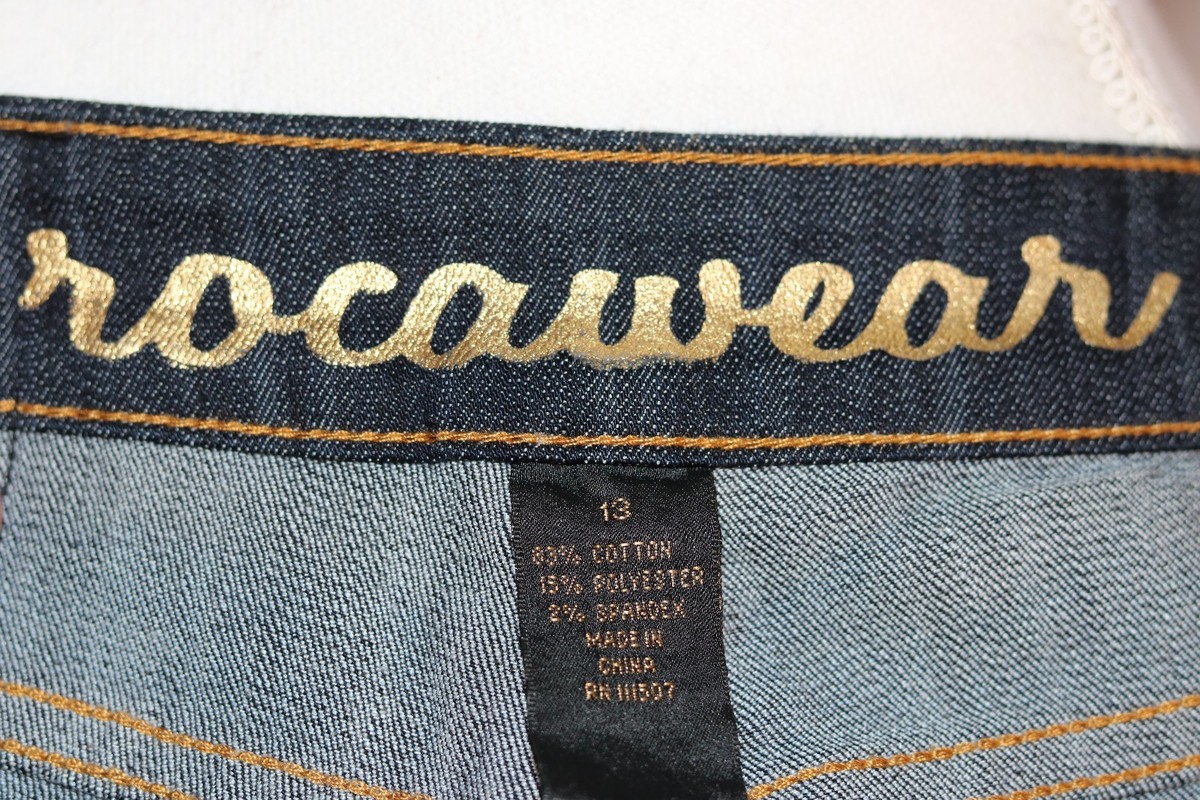 Pantalon Jean Rocawear Bleu Denim Taille 13 - Coupe Wide Leg, Motif Crâne Doré, Occasion Très Bon état