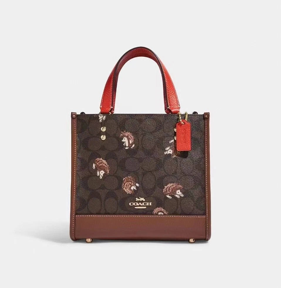 Borsa Coach Dempsey nuova con etichette 22 pollici tela firmata con stampa riccio CC769