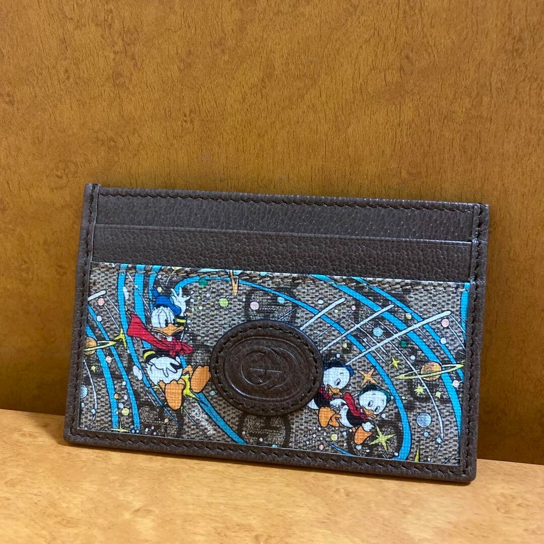 グッチ　ドナルド　財布 GUCCI WALLET DONALD DUCK GUCCI x Disney Donald Duck Collaboration Holder Wallet GG