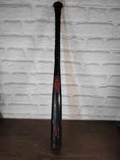 Baseball Bat: Youth 125 ash genuine louisville slugger 28 inches wooden, used