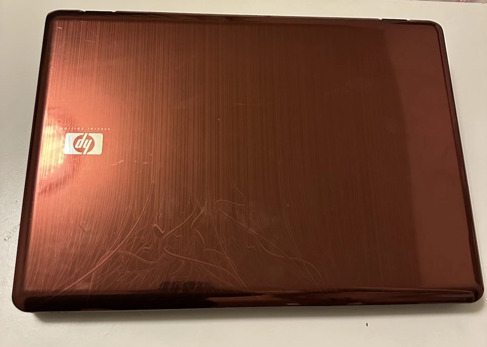 Portátil HP Pavilion dv6700 edición especial (bronce) sin cargador, sin disco duro, no se enciende” Foto 2 de 4