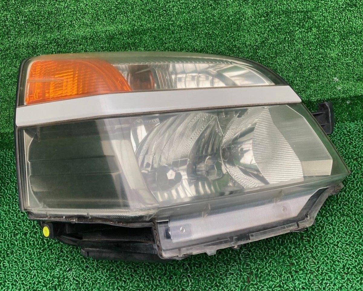 Apple - ペルシア△ Headlight Headlamps100-77691 Genuine TOYOTA VOXY AZR60G