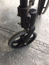 Merits 1200 wheelchair Left Wheel And Bracket. Great Condition.
