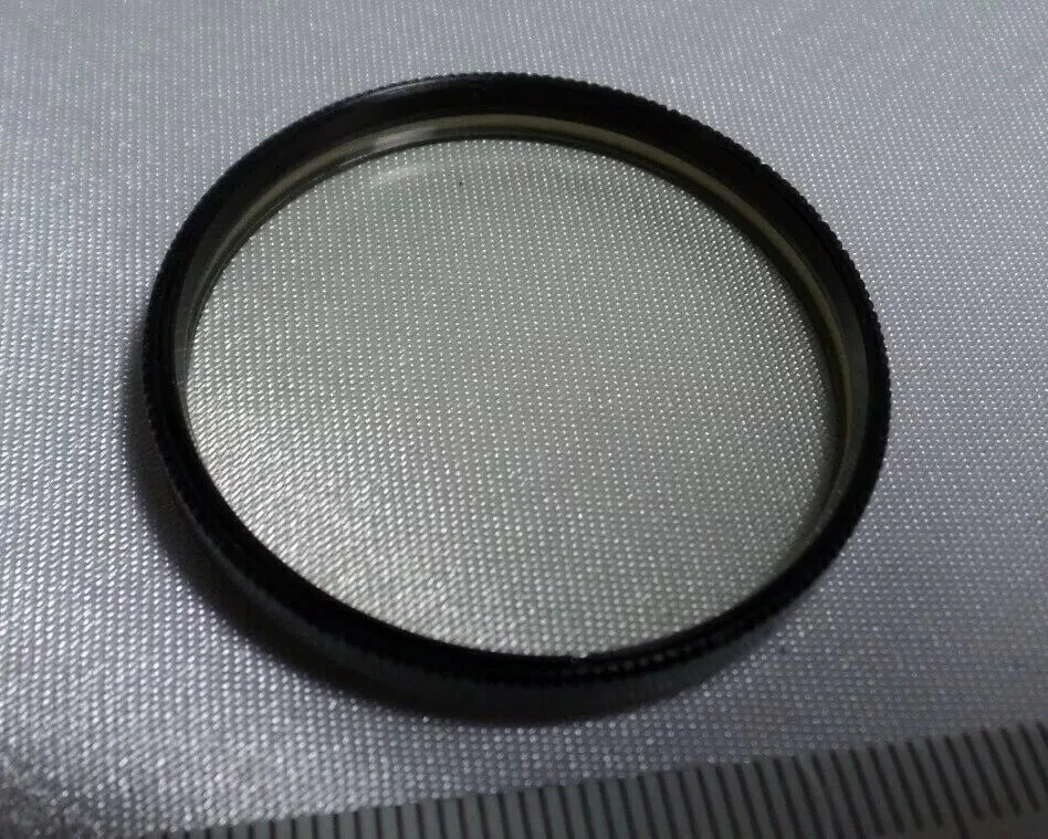 a Yellow ZHS-10 Vintage 40,5x0,5mm light filter of jupiter industar lens 2252