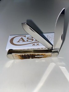 CASE XX #00163 AMBER BONE PEACH SEED JIG TRAPPER CS