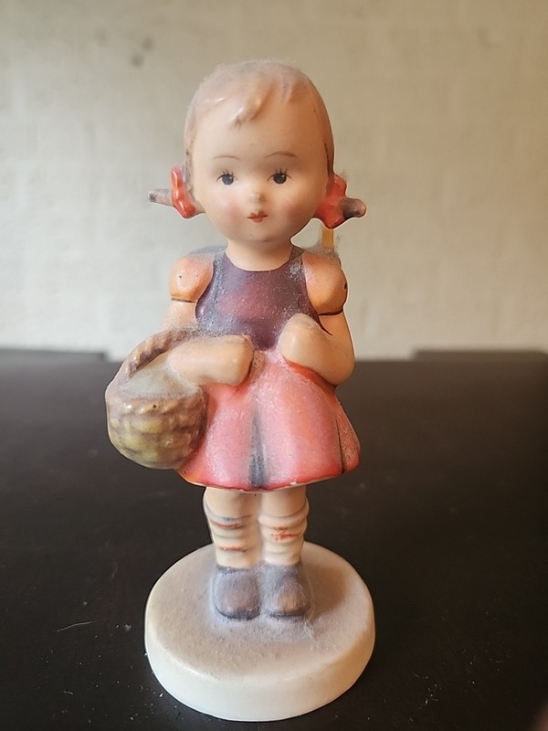 vintage Goebel Hummel "School Girl" figurine, numbered 81.