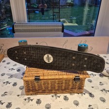 Black Mini Cruiser Skate Board With Blue Wheels