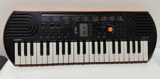 Casio SA-76 44-Key Electronic Keyboard Black/Orange Built-In Speaker