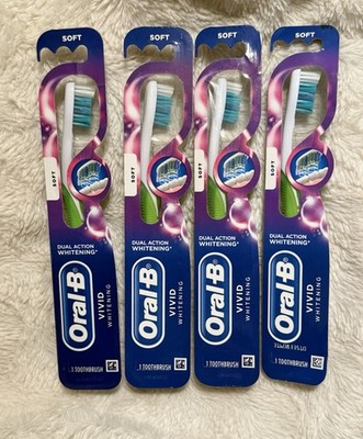 4 New Oral B Vivid Luminous Soft Toothbrushes Dual Action Whitening