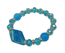 Turquoise beaded stretch bracelet with large glass bead and round glass beads