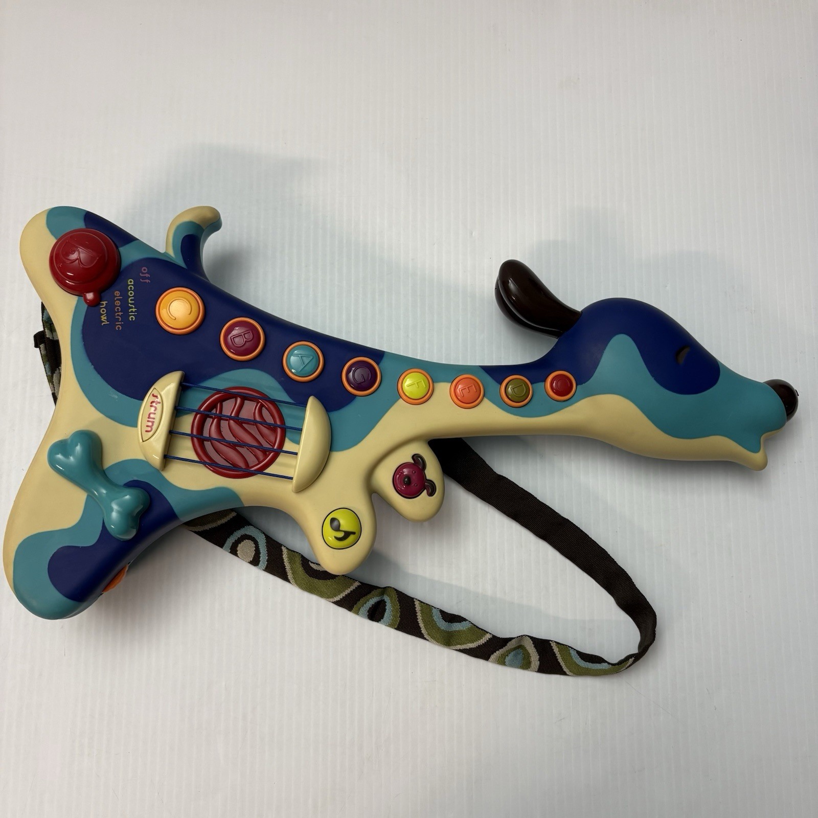 B. Toys Woofer Interactive Dog Guitar & Strap Works Musical 