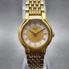 Seiko Watch Women 19mm White Dial Gold Tone Round V401-0289 New Battery