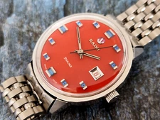 VINTAGE RADO STARLINER AUTOMATIC DATE SWISS MADE SS VINTAGE ORANGE DIAL GENTS.