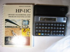 HP-11C Calculator With Original Manual and Slip Case