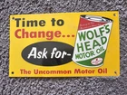 Vintage Porcelain Wolf's Head Motor Oil Porcelain Metal Sign Size  12" X 7"
