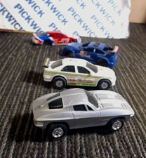 2 Slot Cars Complete & Two Slot Car Bodies 1963 Corvette & 3 Others.... Scale ?