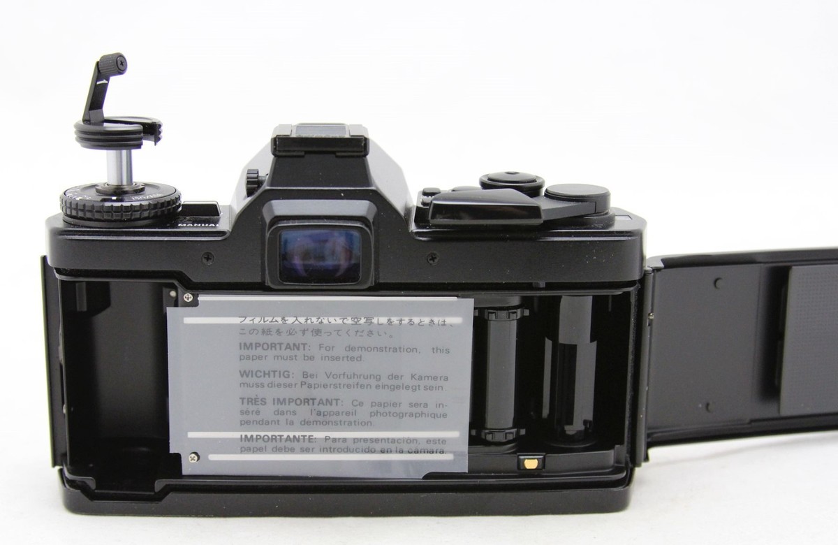 Olympus OM 4 Ti, vintage SLR camera & Zuiko lens Auto Zoom 35-70mm