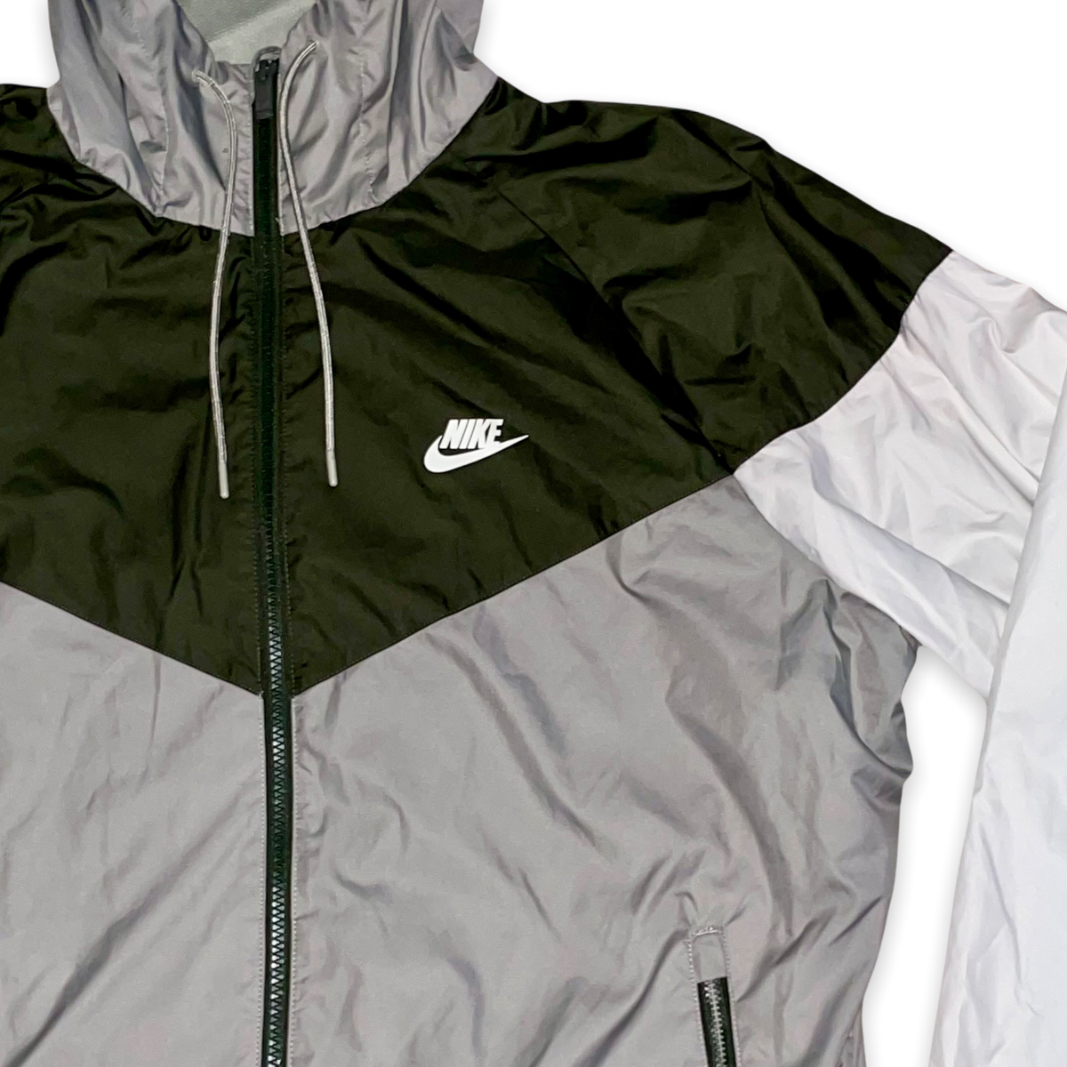 olive green and white nike windbreaker