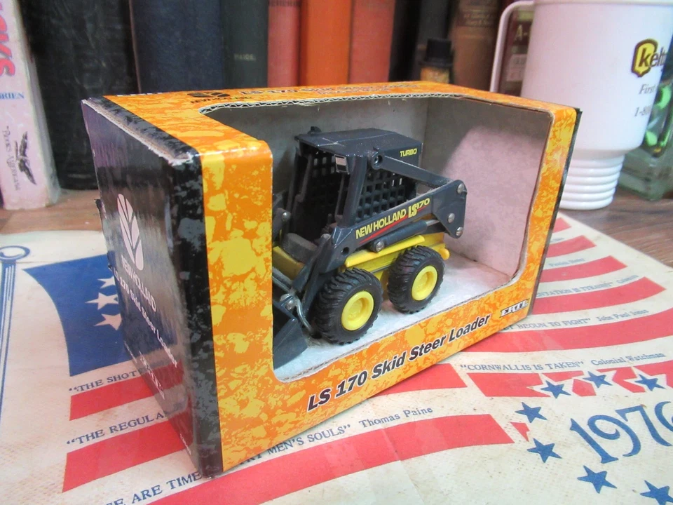 Minicargadora COMO NUEVA 1:32 Gran Bretaña ERTL 13563 Construcción NUEVA HOLANDA LS 170 Foto 3 de 4