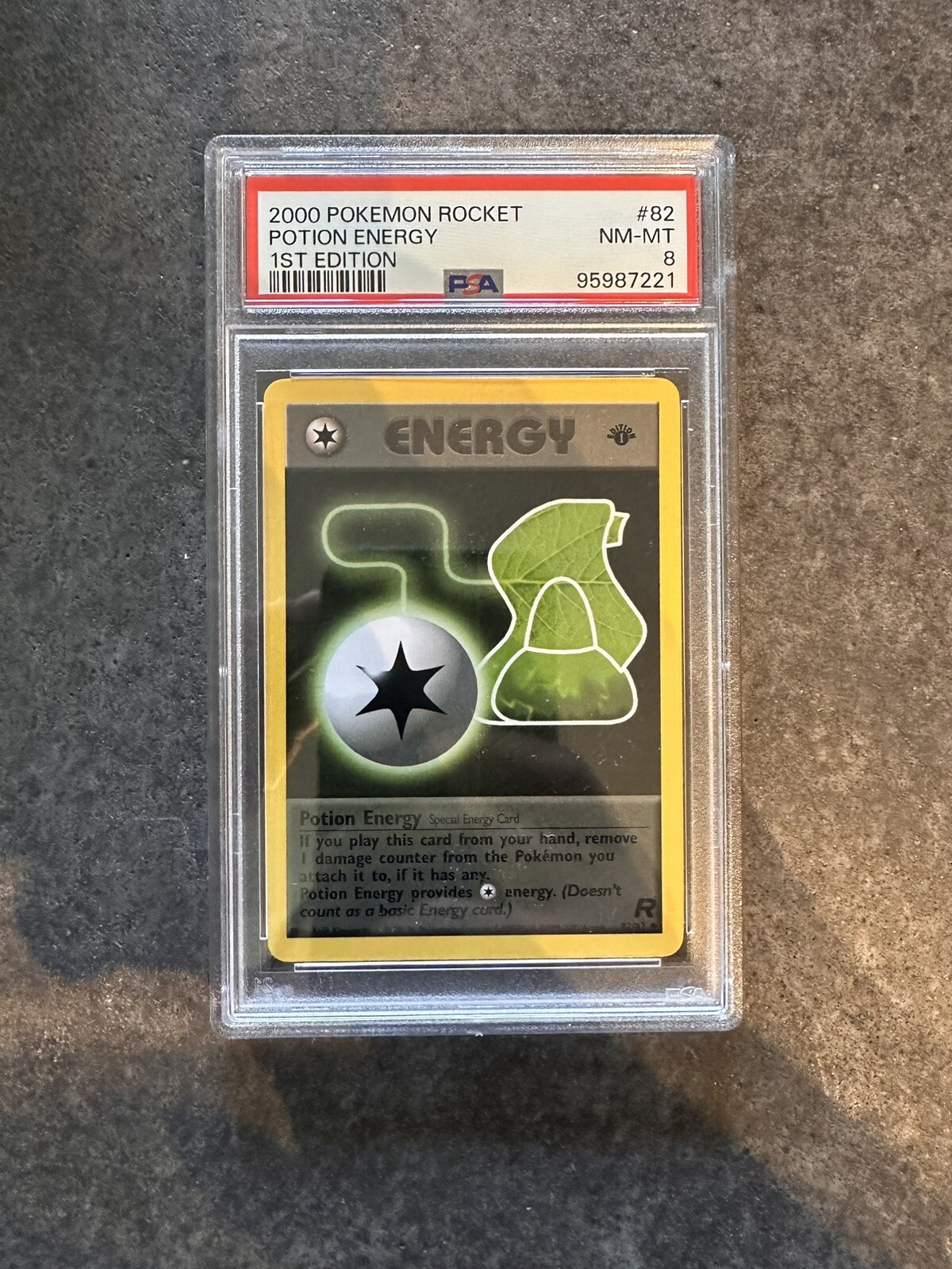 PSA 8 POTION ENERGY 1ST EDITION 82/82 1999 POKEMON TCG TEAM ROCKET WOTC