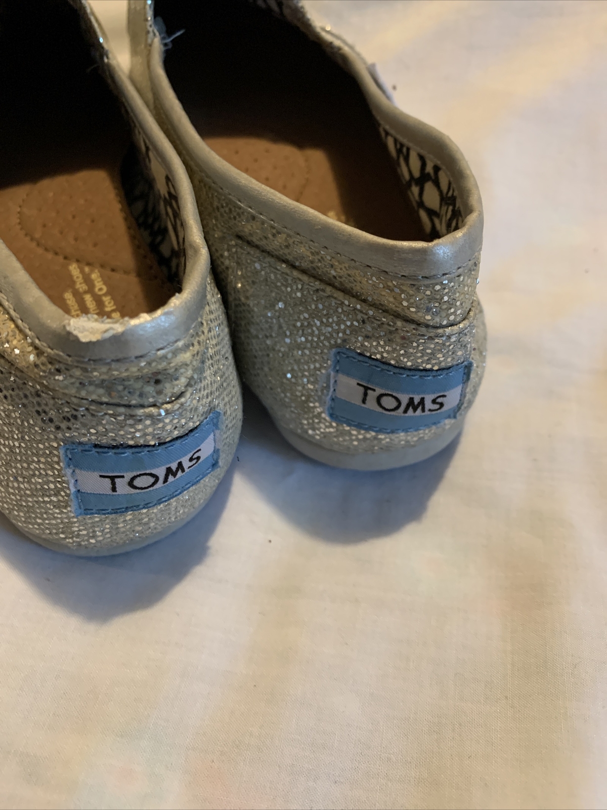 Lightly worn Women's Tom's classics sliver glitter Size 7 Sparkly Used