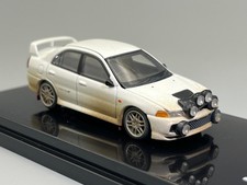 Mitsubishi Lancer Evolution IV GSR White Muddy Rally Car Motorhelix 1/64 scale
