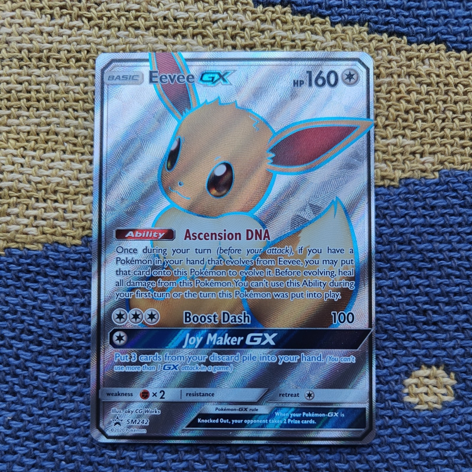 Eevee GX SM242 NM Pokémon Card Black Star Promo