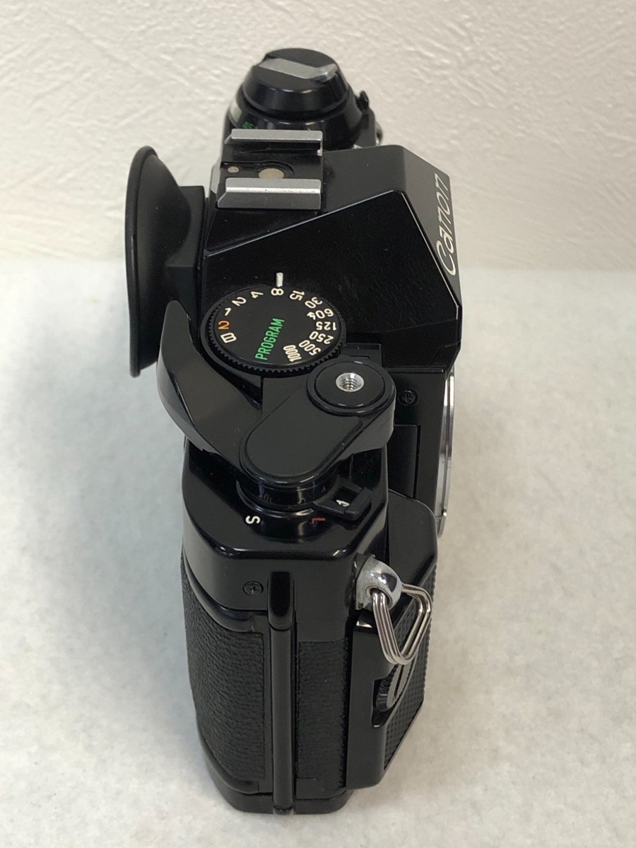 Canon AE-1 Program Film camera with lens 35-70mm f/3.5-4.5 Japan