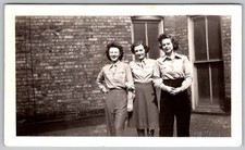 Vtg B&W Snapshot Three Women Friends Smiling Brick Wall Fashion 1940s