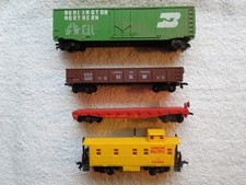 LOT of 4 VINTAGE HO SCALE ASSORTED FREIGHT CARS - BOX, GONDOLA, FLAT CABOOSE