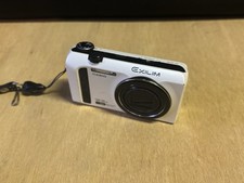 Casio Exilim EX-ZR100 Digital Camera w/ battery, 4 GB SD Card US Seller