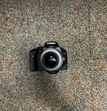 Canon EOS Rebel T2i 18MP DSLR Camera w/ 18-55mm Lens, Battery