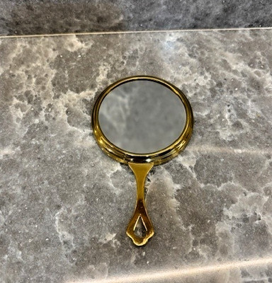 Two Sided Make-up Mirror:  Regular/Magnifying. Gold trim. Purse size perfect.