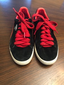 puma red and black sneakers