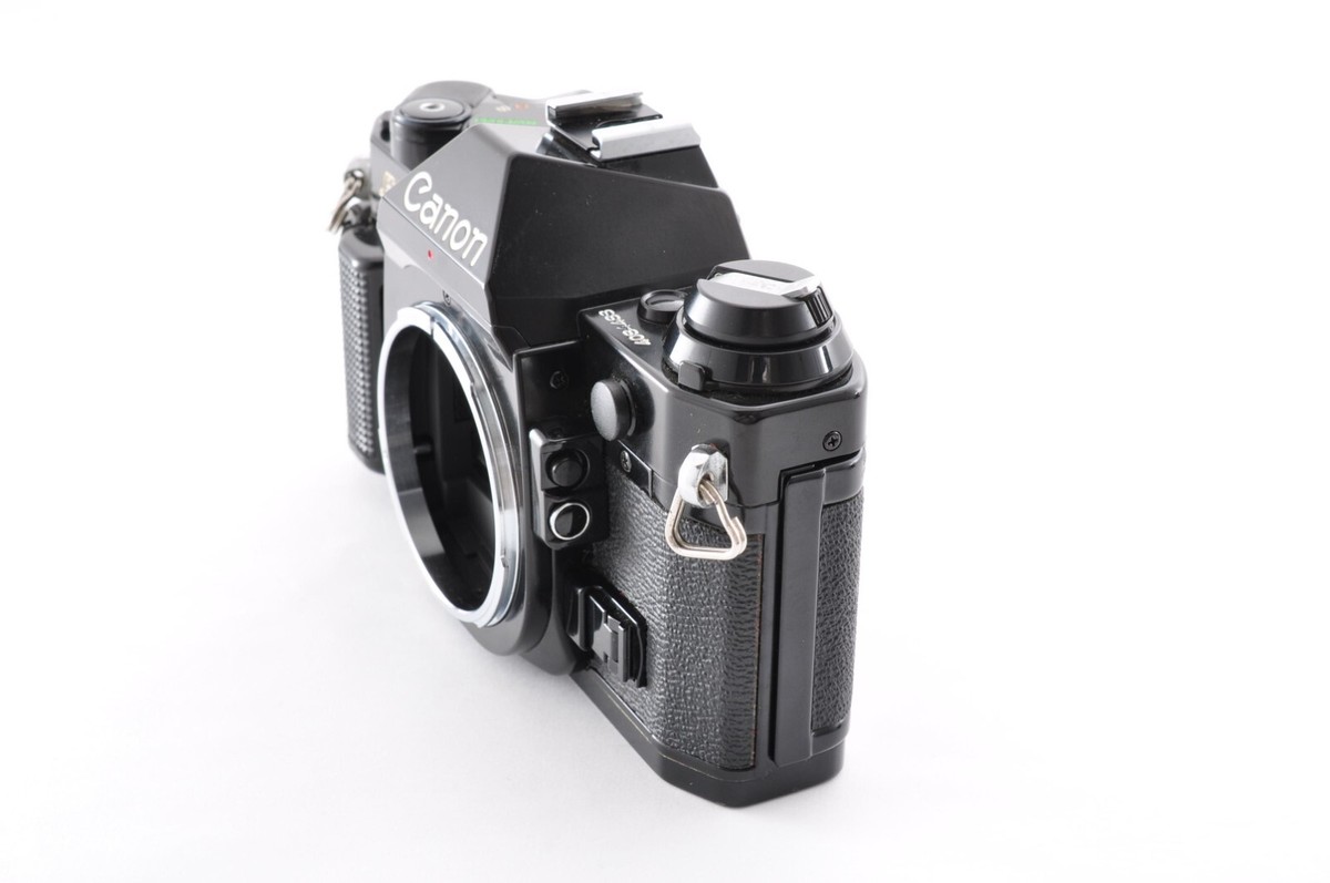 Canon AE-1 Program Black / Lens New FD 35-70mm f/3.5-4.5 Exc Canon AE-1 Program Black / Lens New FD 35-70mm f/3.5-4.5 Exc