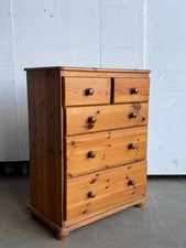 A modern pine chest of drawers