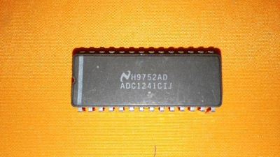 NSC ADC1241CIJ Self-Calibrating 12-Bit Plus Sign mP-Compatible ADC CDIP28 X 1PC