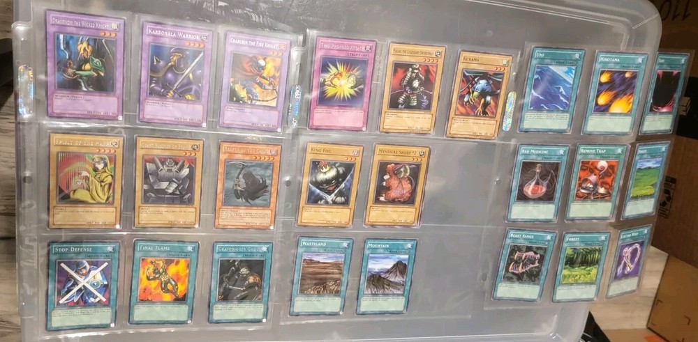 Vintage Yu-gi-oh cards lot with Ultra Pro folder sleeves LOB