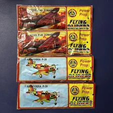 4 Vintage Sealed Power Prop Flying Gliders Airplanes P-40 Tomahawk Air Cobra P39